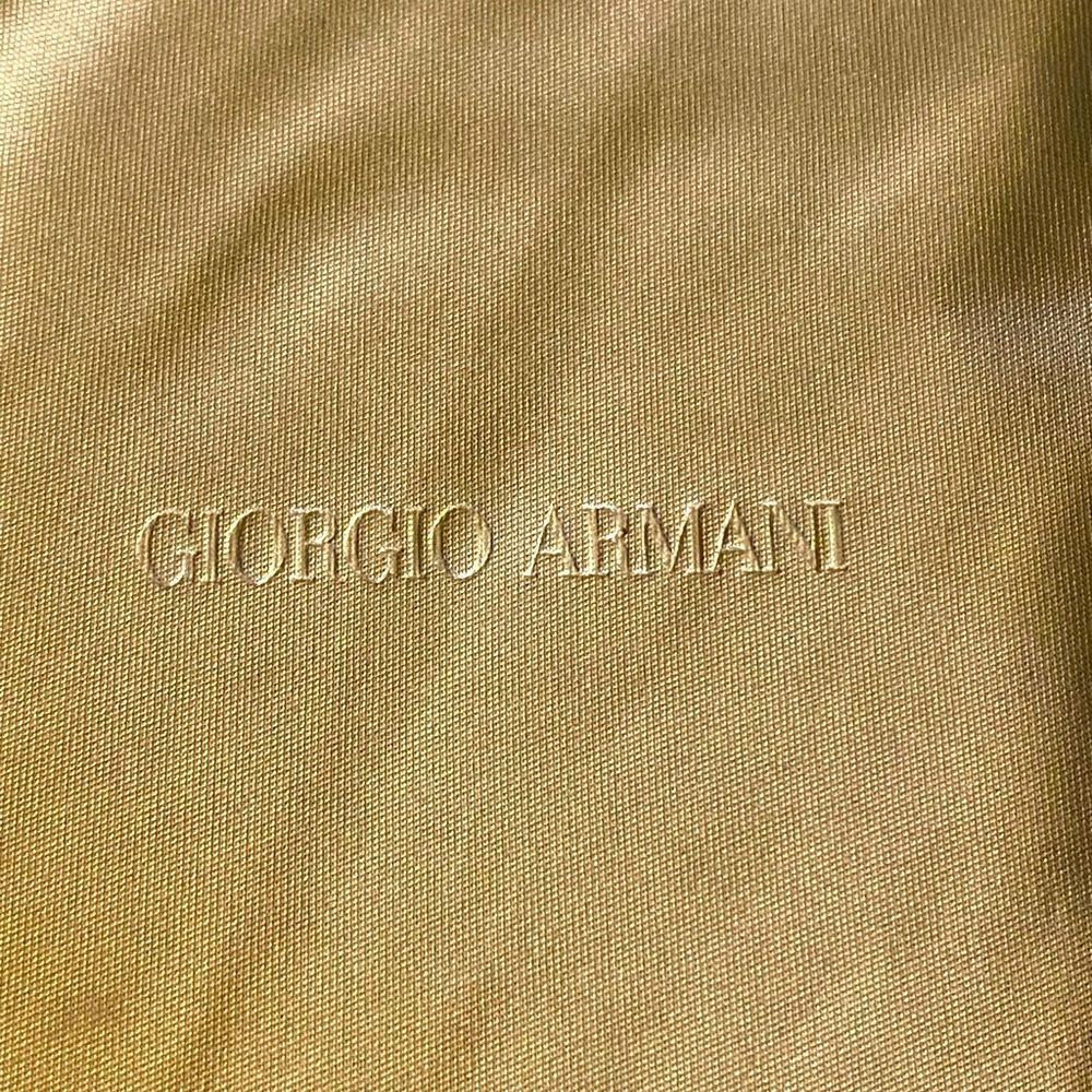 Giorgio Armani and Prada eyeglass cases